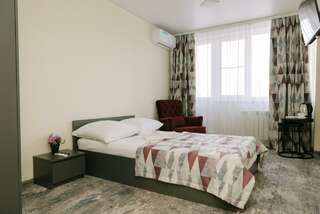 Гостиница Дружба Абакан 2-местный 2-комнатный номер улучшенный стандарт с 2 односпальными кроватями-1